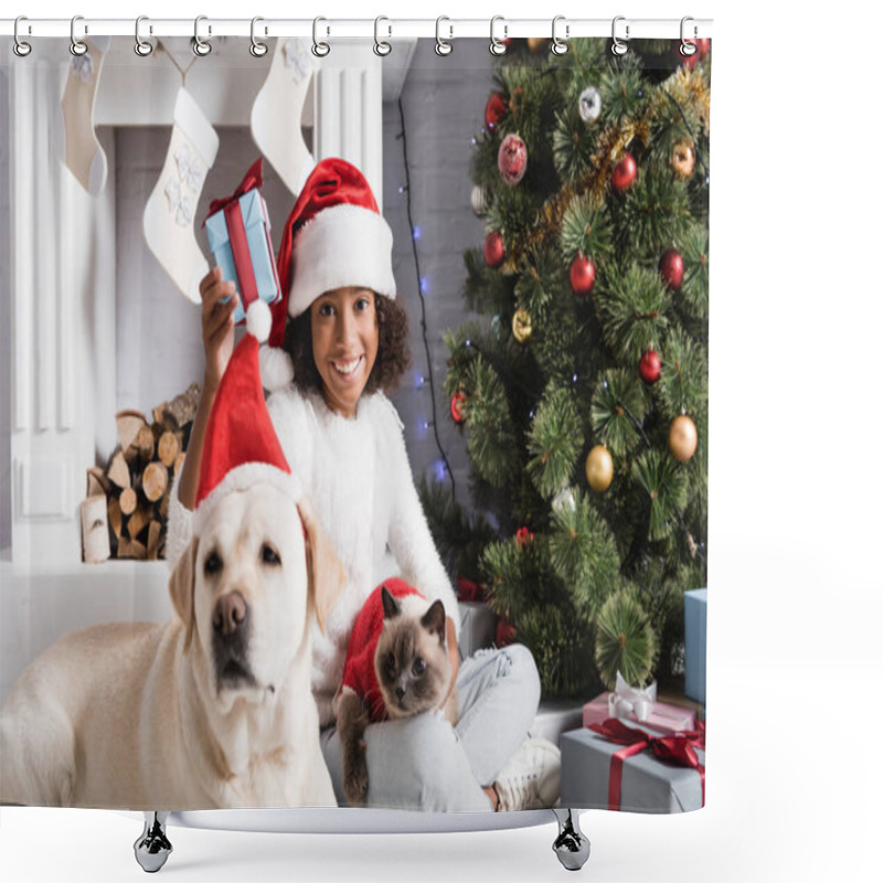 Personality  Joyful African American Girl Holding Christmas Gift Near Labrador Dog On Blurred Foreground   Shower Curtains