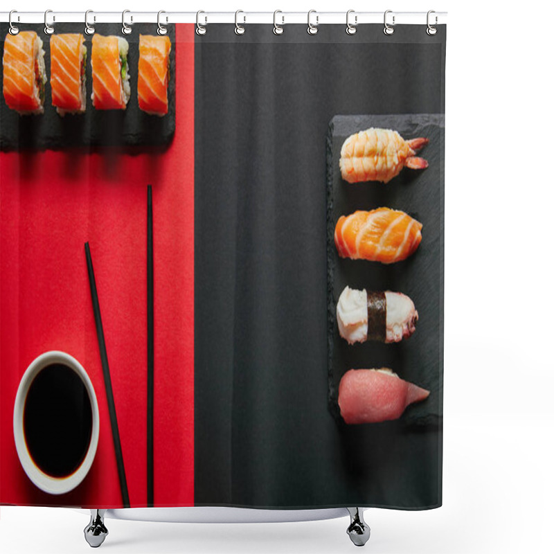 Personality  Flat Lay With Soya Sauce In Bowl, Chopsticks And Sushi Sets On Black Slate Plates On Red And Black Background Shower Curtains