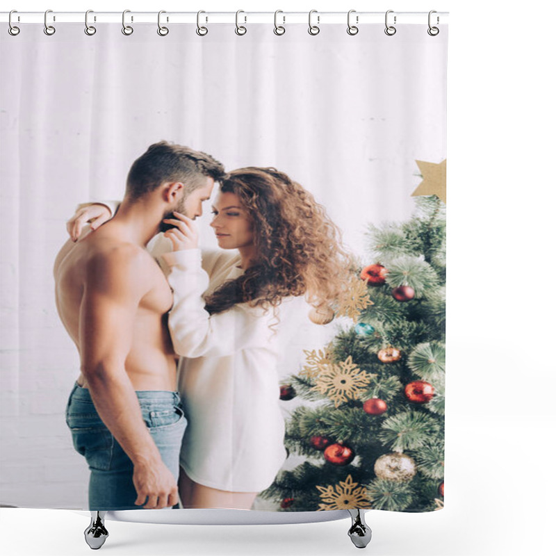 Personality  Cheerful Young Woman Embracing Shirtless Boyfriend Near Christmas Tree At Home Shower Curtains