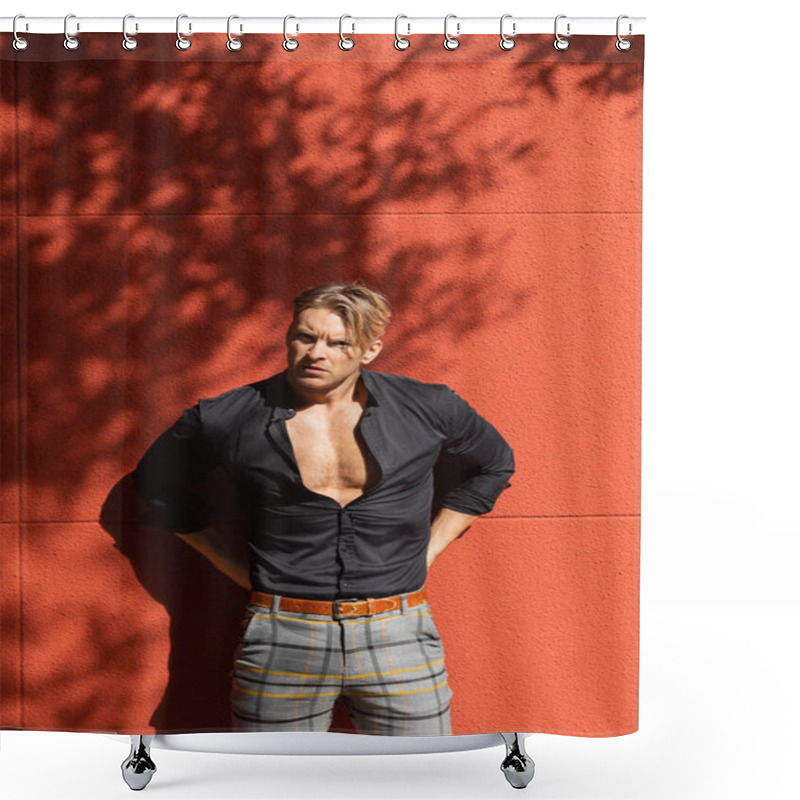 Personality  A Muscular Blonde Man Poses With A Confident Expression Against A Red Brick Wall. He Is Wearing A Black Button-down Shirt Unbuttoned To Reveal His Chest And Plaid Pants. Shower Curtains