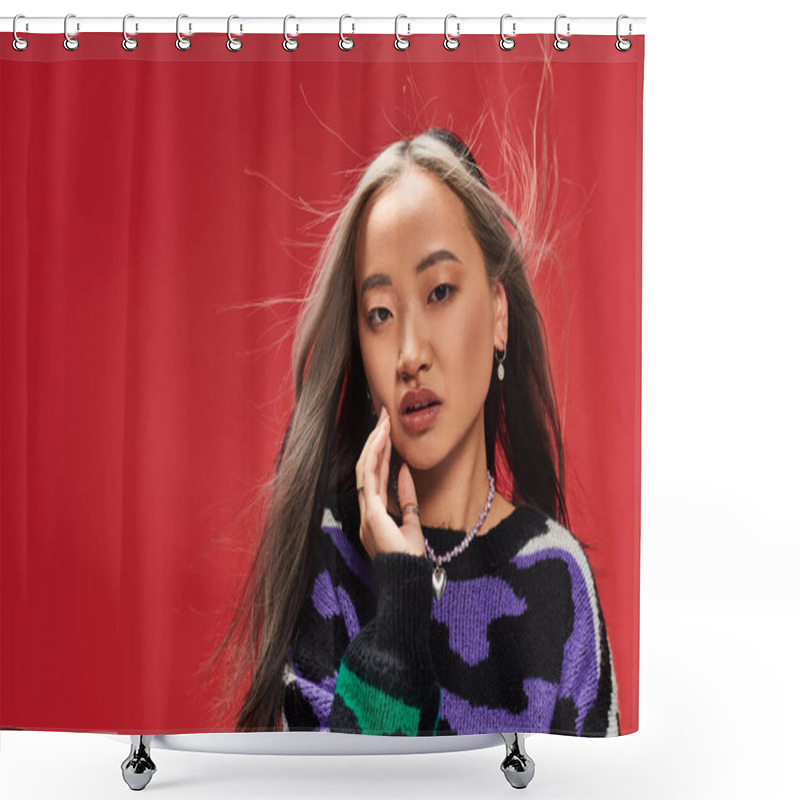 Personality  Alluring Young Asian Woman With Dyed Hair In Sweater With Animal Print Touching Cheek On Red Shower Curtains