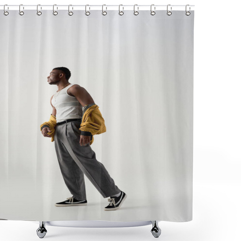 Personality  Side View Of Muscular African American Man In Bomber Jacket And Sleeveless T-shirt Standing On Grey Background, Contemporary Shoot Featuring Stylish Attire, Fashion Statement  Shower Curtains