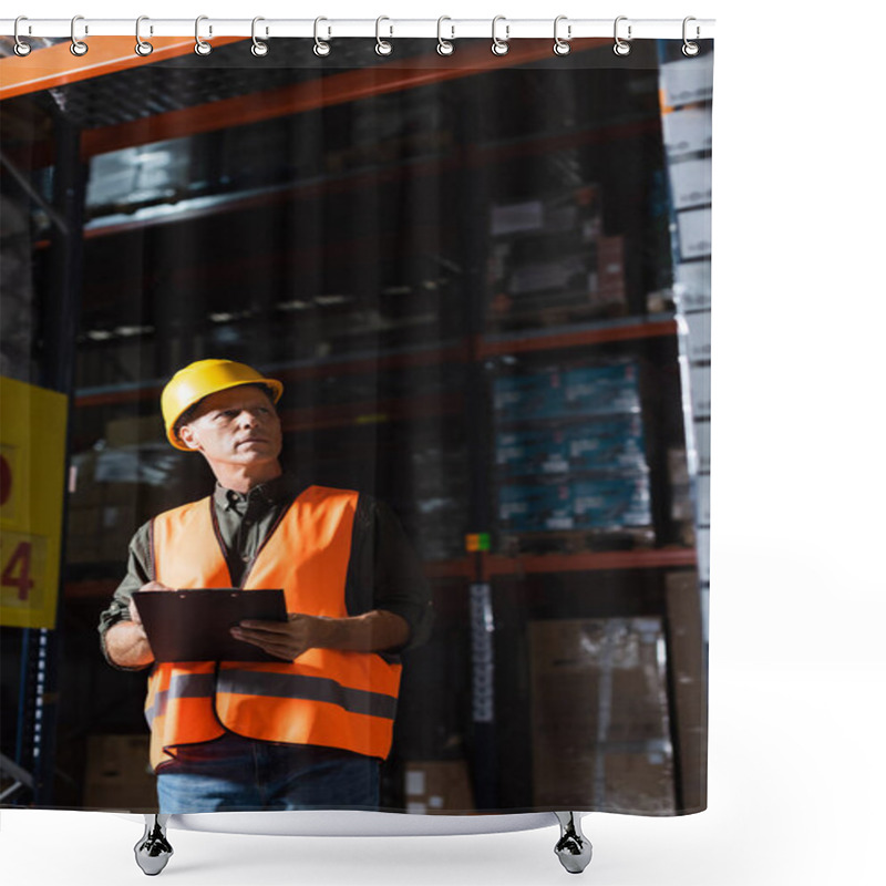 Personality  Focused Middle Aged Warehouse Supervisor In Hard Hat With Clipboard Looking At Cargo On Shelves Shower Curtains