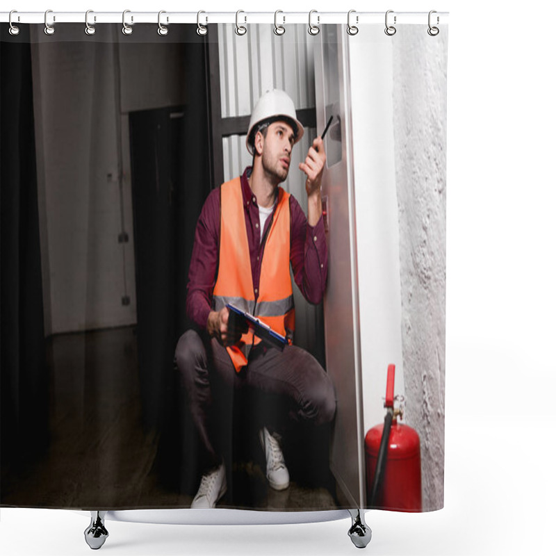 Personality  Handsome Firefighter In Helmet Sitting And Pointing At Fire Panel With Pen While Holding Clipboard Shower Curtains