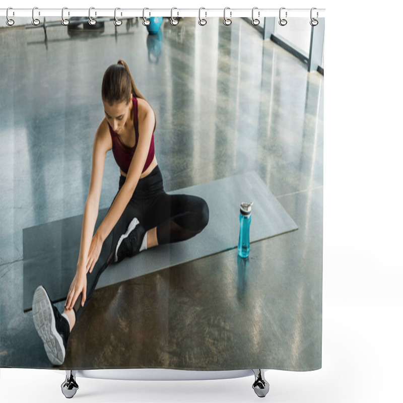 Personality  Concentrated Sportswoman Sitting On Mat And Doing Stretching Exercise At Gym Shower Curtains