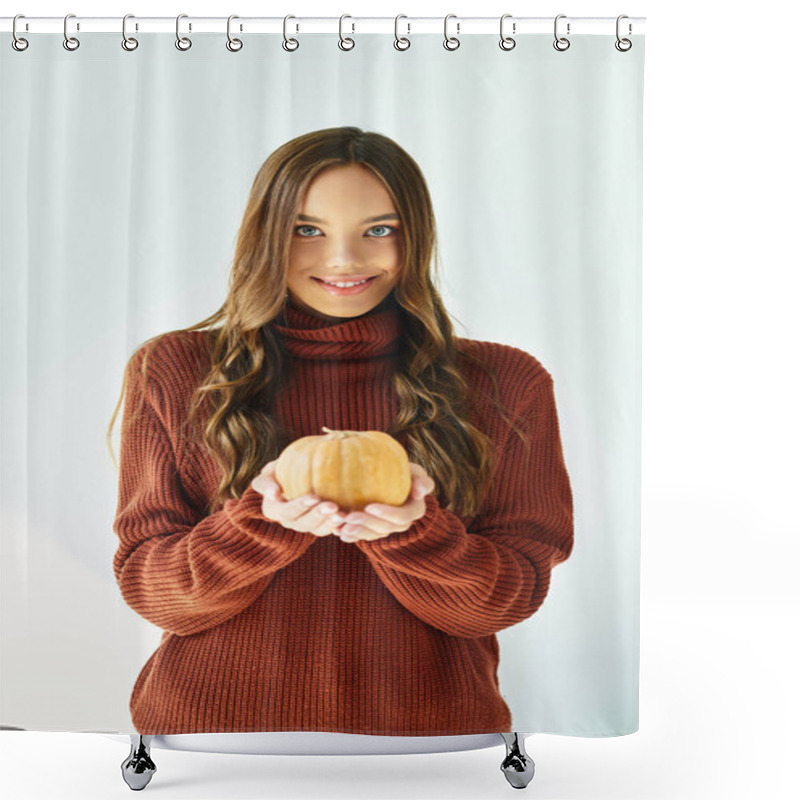 Personality  A Young Woman In A Cozy Sweater Smiles, Presenting A Small Pumpkin For Halloween. Shower Curtains