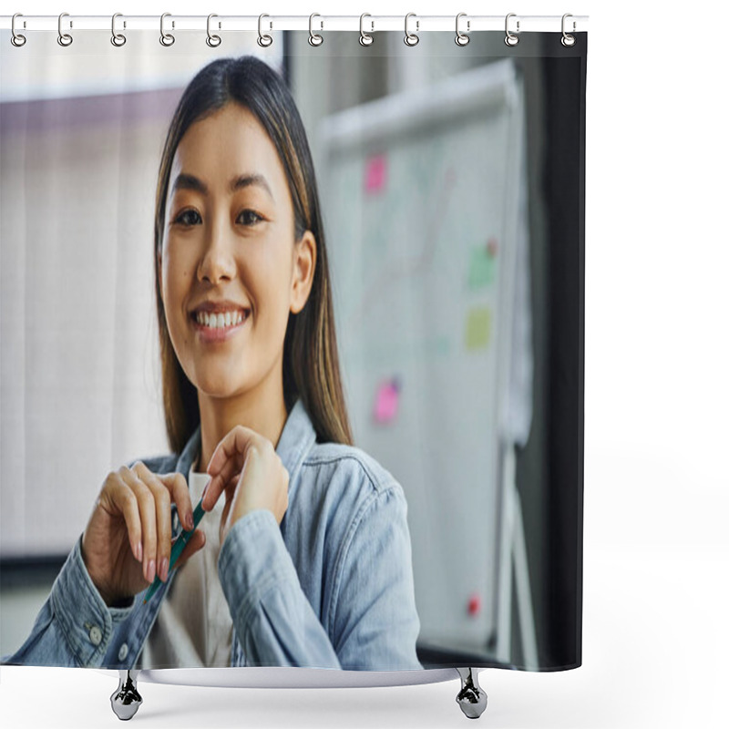 Personality  Portrait Of Young And Charming Asian Businesswoman With Brunette Hair And Cheerful Smile Holding Pen And Looking At Camera In Modern Office, Professional Headshot  Shower Curtains