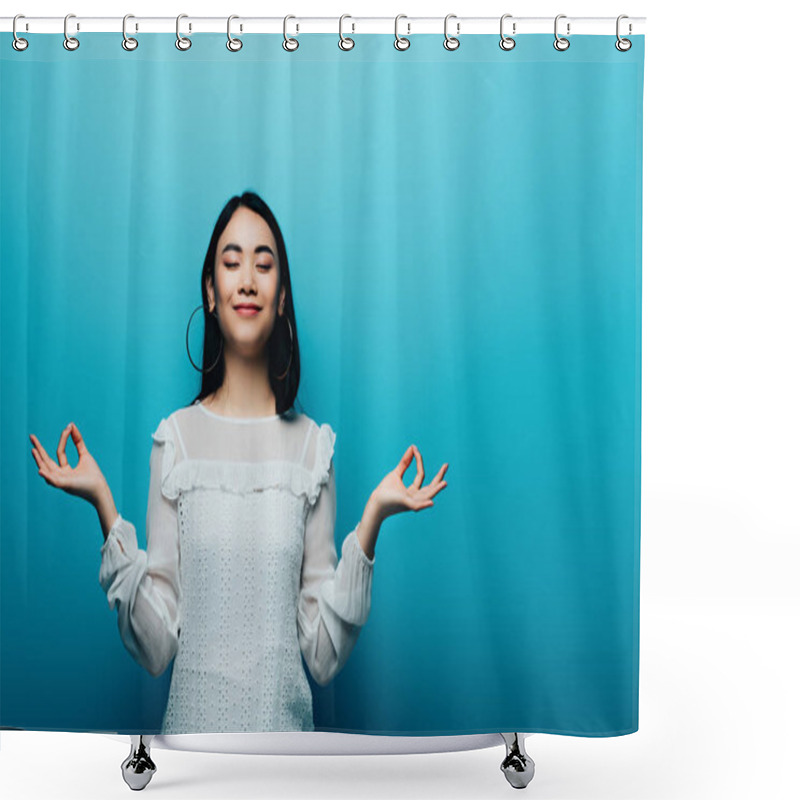 Personality  Happy Brunette Asian Woman Meditating With Closed Eyes On Blue Background Shower Curtains