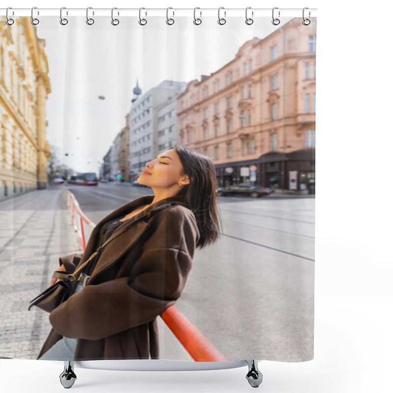 Personality  Side View Of Brunette Woman In Coat Standing Near Railing On Street In Prague  Shower Curtains