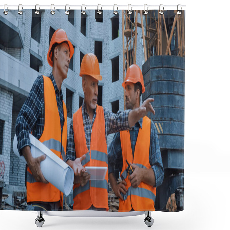 Personality  Mature Worker Pointing With Hand And Talking Near Coworkers And Building Crane On Construction Site Shower Curtains