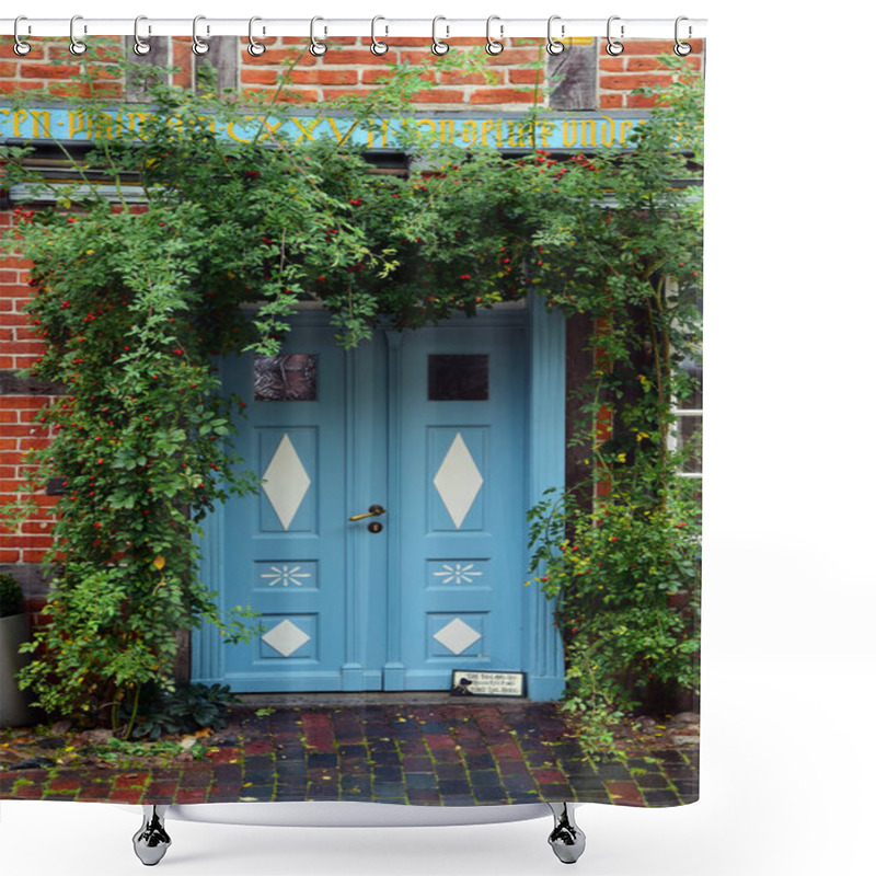 Personality  Blue  Front Door In A Historic House With Climbing Plants At The Shower Curtains