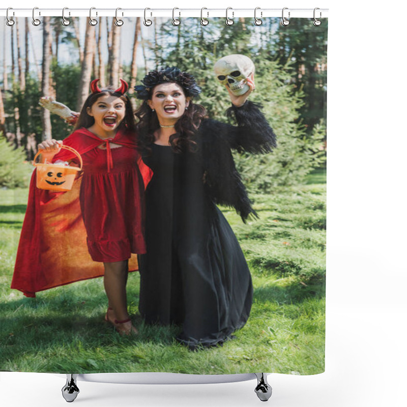 Personality  Mom And Daughter In Halloween Costumes Holding Bucket Of Sweets, Skull And Toy Hand While Screaming In Forest Shower Curtains