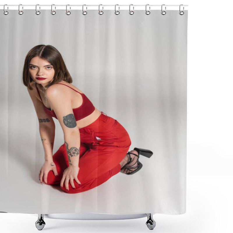 Personality  Young Model In Red Outfit, Tattooed Brunette Woman With Short Hair And Nose Piercing Posing In Red Crop Top And Pants On Grey Background, Modern Style, Generation Z, Fashion Trend  Shower Curtains