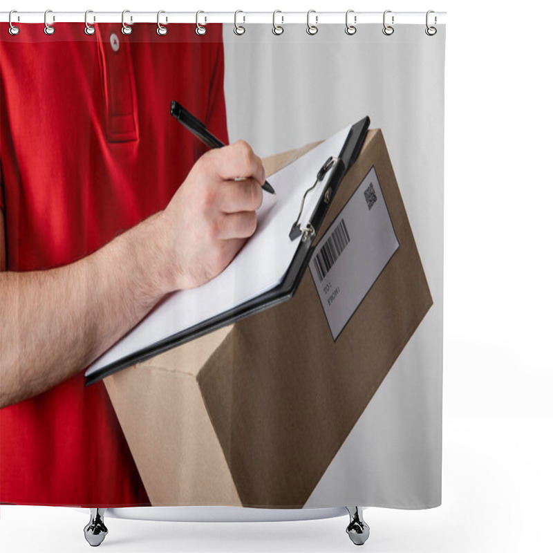 Personality  Cropped View Of Courier Writing On Clipboard With Empty Blank And Holding Cardboard Box Isolated On Grey Shower Curtains