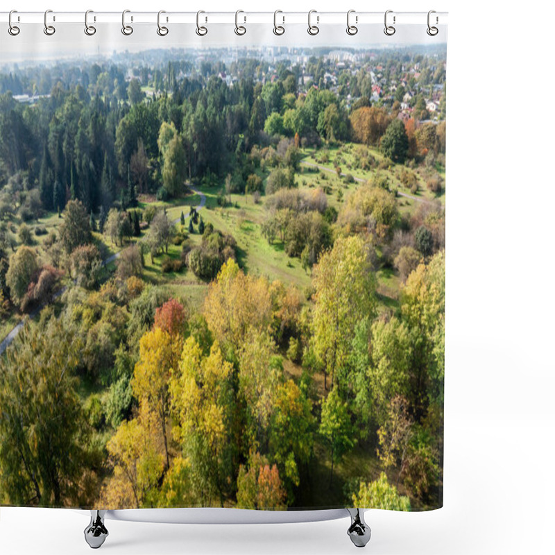 Personality  An Expansive Botanical Garden Features Diverse Trees And Shrubs In Green And Autumnal Hues, With Winding Paths And A Cityscape Visible In The Background. Shower Curtains