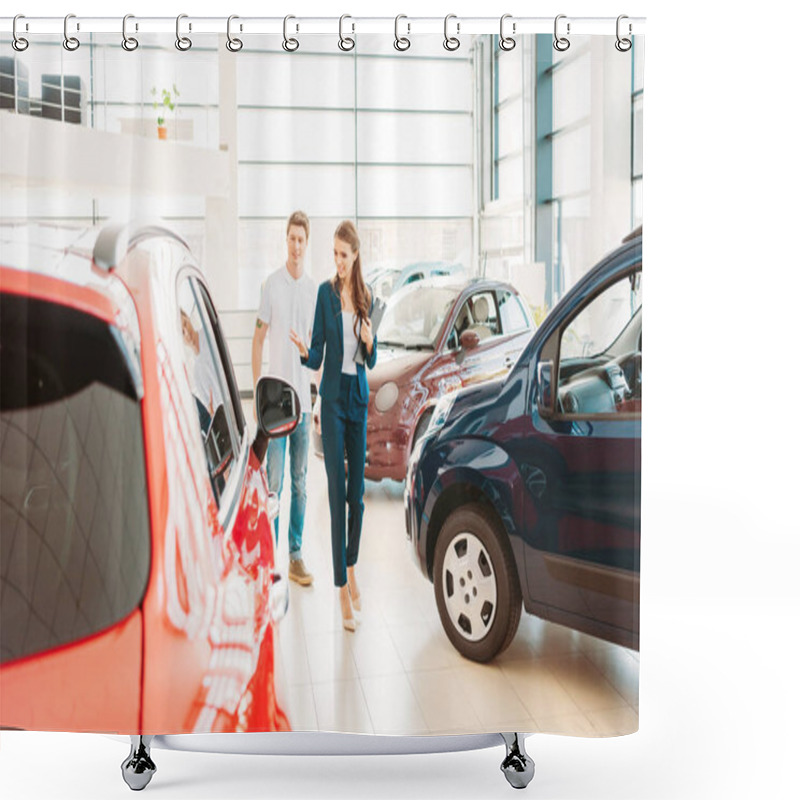 Personality  Front View Of Woman With Clipboard Showing Automobile To Male Client In Car Showroom  Shower Curtains