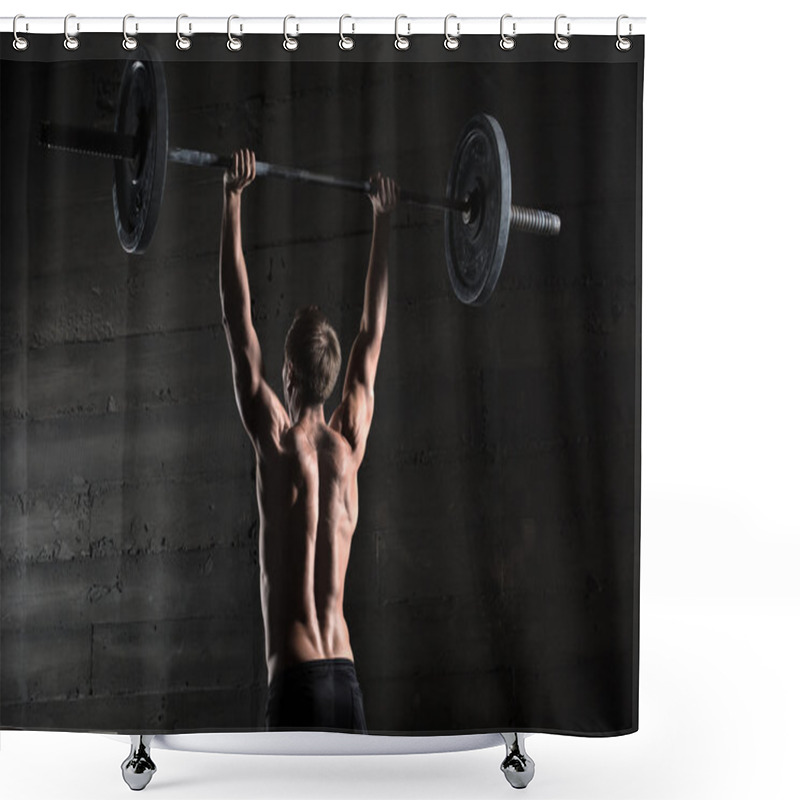 Personality  Portrait Of A Handsome Athlete From Behind. Athlete Raises The B Shower Curtains