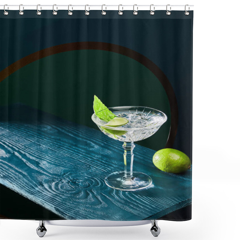 Personality  High Angle View Of Cocktail Glass With Mint Leaf And Whole Lime On Blue Wooden Surface On Geometric Background With Circle Shower Curtains