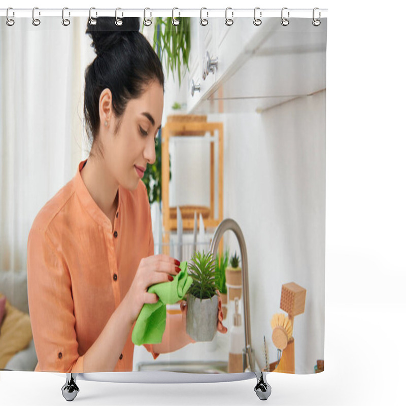 Personality  A Stylish Woman Holding A Potted Plant In A Cozy Kitchen Setting. Shower Curtains