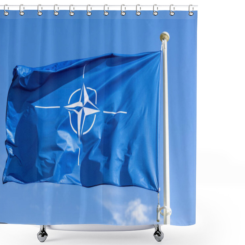 Personality  The Blue NATO Flag Flutters Against The Blue Sky. Military Alliance Symbol Shower Curtains