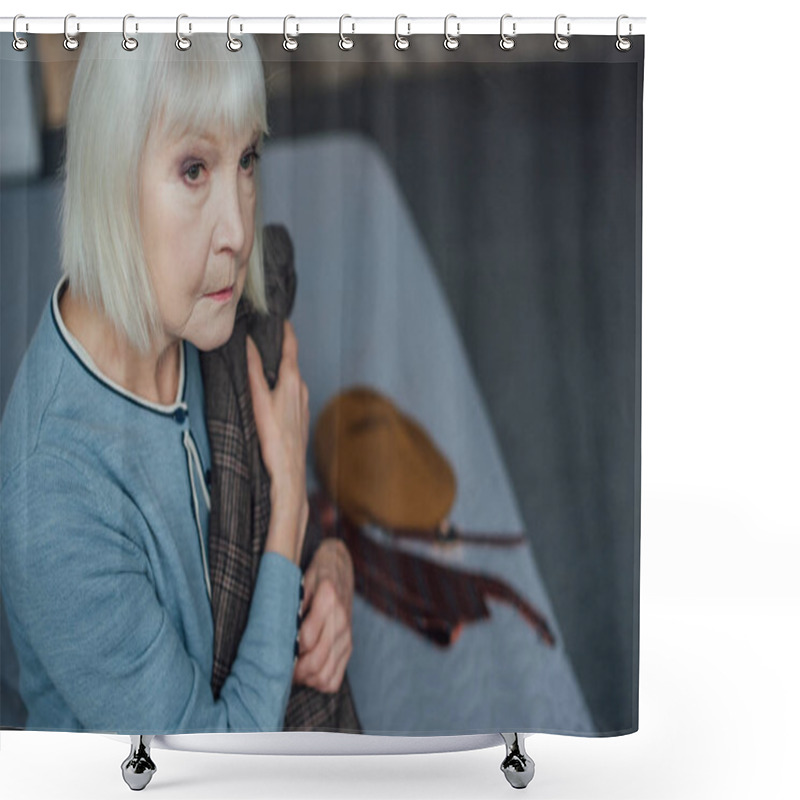 Personality  Sad Senior Woman Sitting On Bed, Looking Away And Holding Jacket At Home Shower Curtains