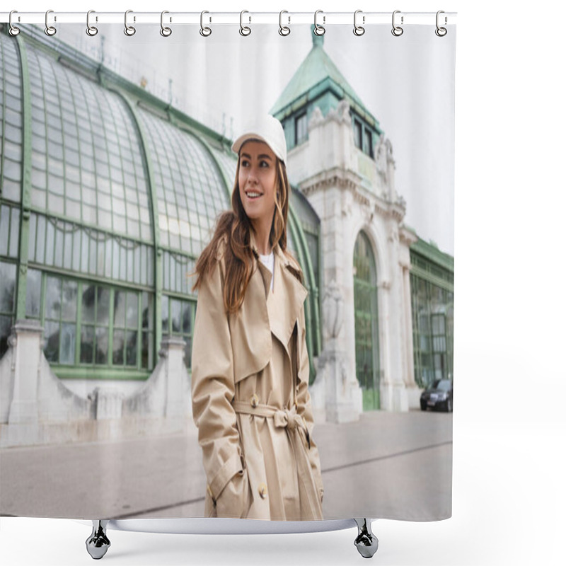 Personality  Pleased Young Woman In Trench Coat And Baseball Cap Standing With Hands In Pockets On Rooftop Shower Curtains