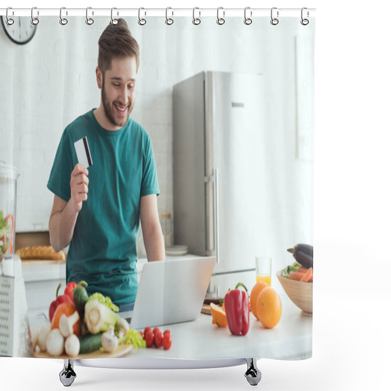 Personality  Smiling Man With Credit Card And Laptop Buying Goods Online In Kitchen At Home Shower Curtains