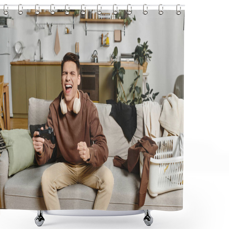 Personality  A Young Man Celebrates A Gaming Victory, Immersed In Joy And Comfort At Home With Cozy Decor. Shower Curtains