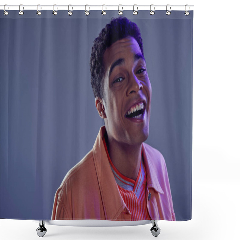 Personality  Portrait Of Joyous African American Guy In Peach Shirt Laughing On Grey Background With Blue Light Shower Curtains