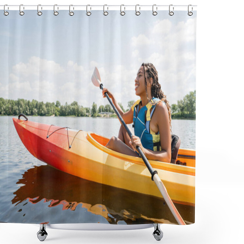 Personality  Side View Of Carefree And Active African American Woman In Life Vest Holding Paddle While Sailing In Kayak On Lake With Green Picturesque Shore In Summer Shower Curtains