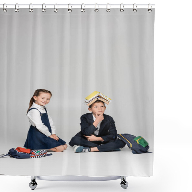 Personality  Pensive Schoolboy With Books On Head Sitting Near Cheerful Girl On Grey Shower Curtains