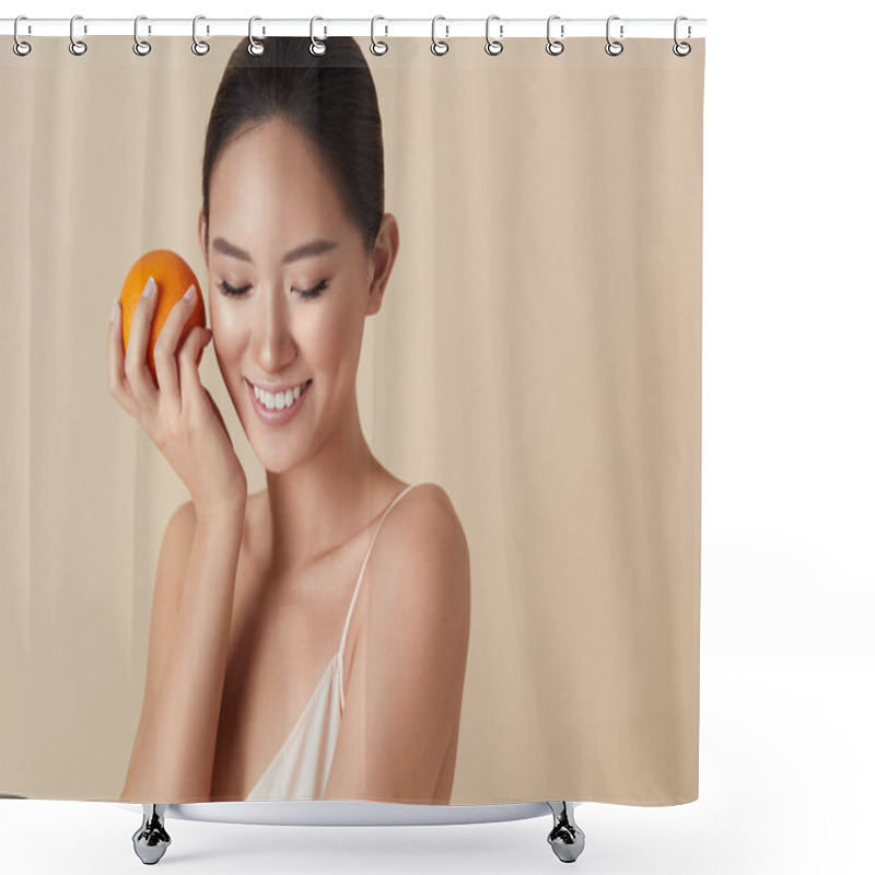 Personality  Beauty Face. Fruit And Model Portrait. Smiling Asian Woman Holds Juicy Orange In Hand And Looking Down. Natural Vitamins For Healthy Skin. Beautiful Ethnic Girl With Citrus On Beige Background.  Shower Curtains