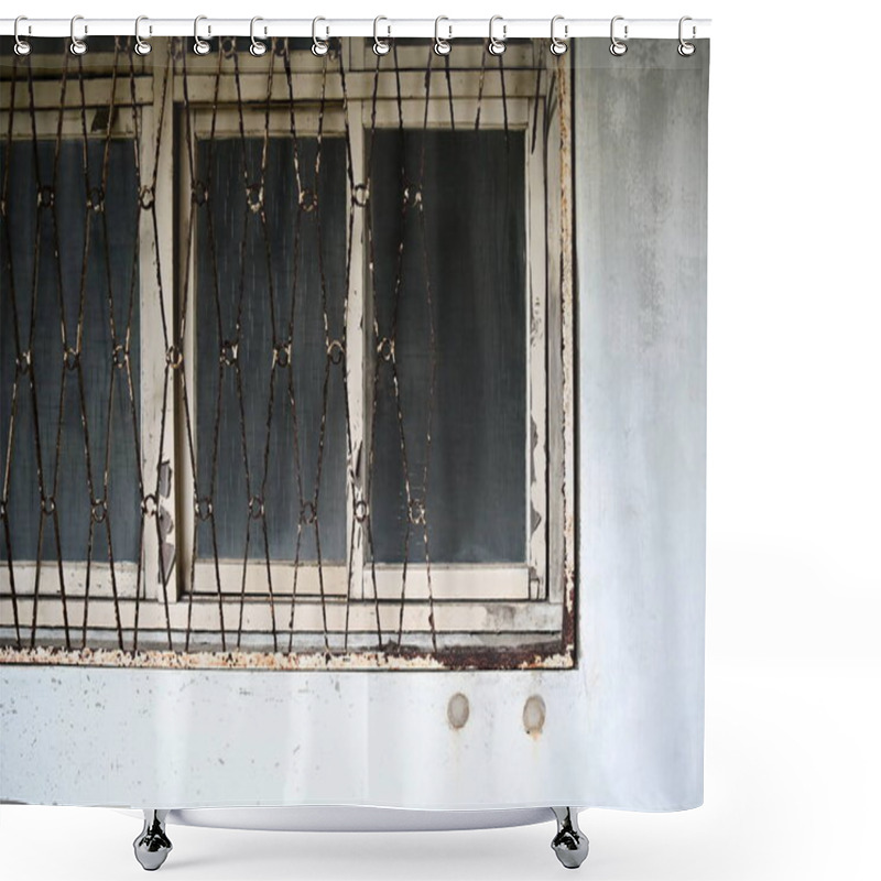 Personality  A Nostalgic Wooden-framed Window Features An Aged Iron Grille With Flaking White Paint And Rust, Embodying The Faded Charm Of A Residence Set For Redevelopment. Shower Curtains