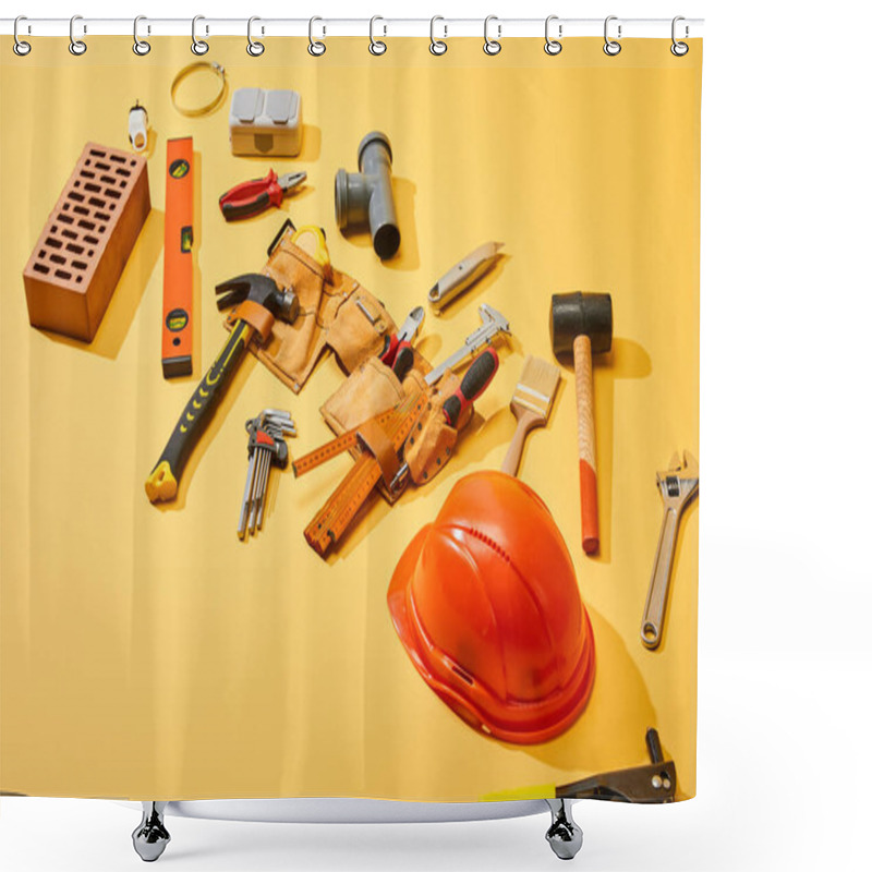 Personality  High Angle View Of Tool Belt With Industrial Tools, Brick And Helmet On Yellow Background Shower Curtains