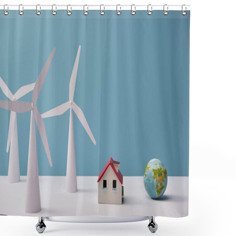 Personality  Windmill And House Models With Small Globe On White Table And Blue Background Shower Curtains