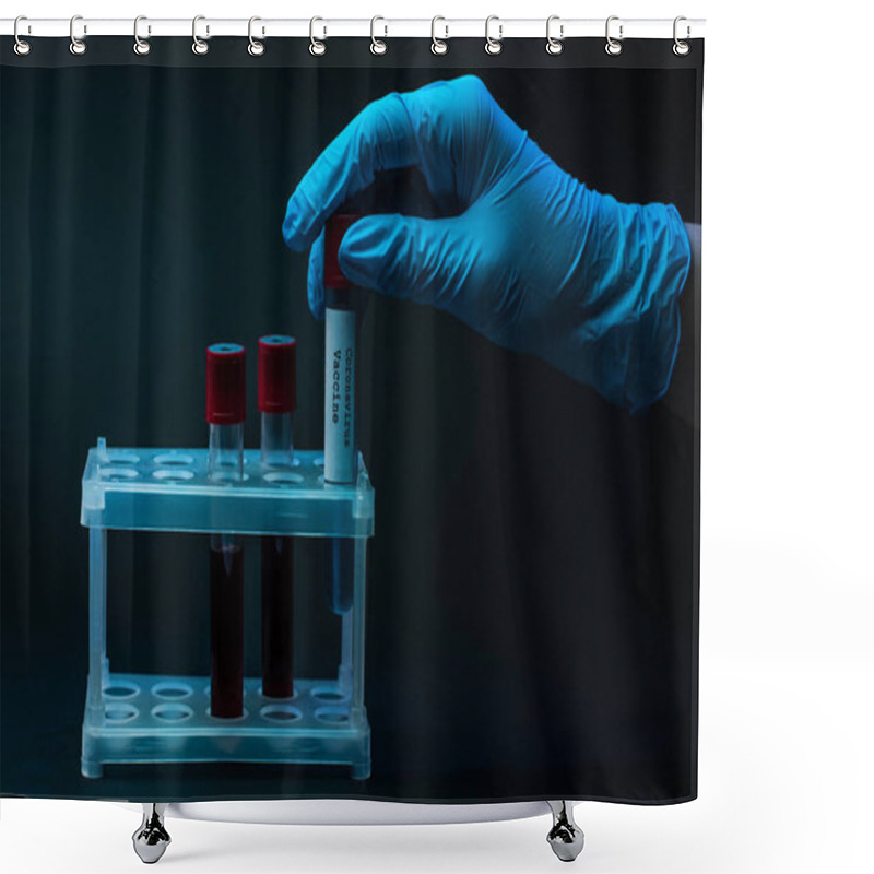 Personality  Cropped View Of Male Hand With Sample Tubes With Coronavirus Vaccine And Blood In Test Tube Rack On Dark Shower Curtains