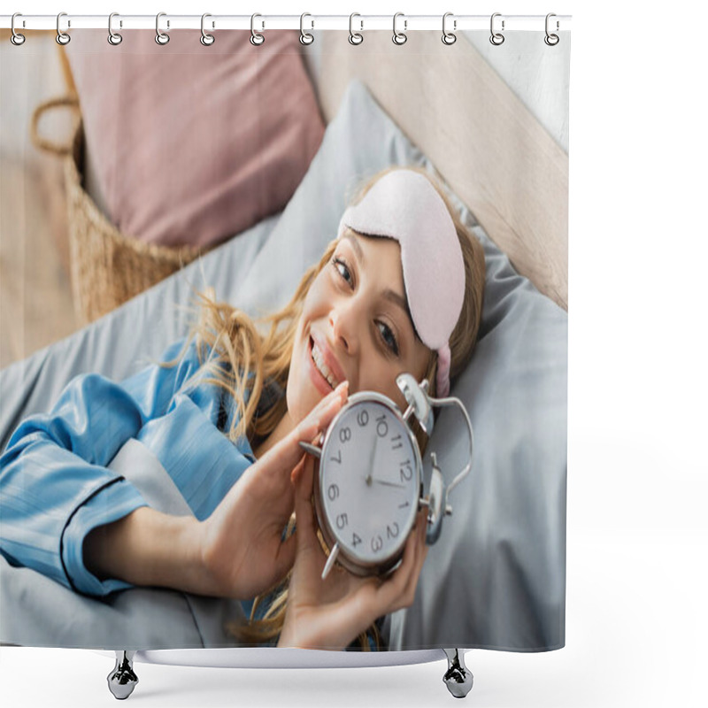 Personality  Top View Of Happy Woman In Sleeping Mask And Blue Pajama Holding Alarm Clock While Lying In Bed  Shower Curtains