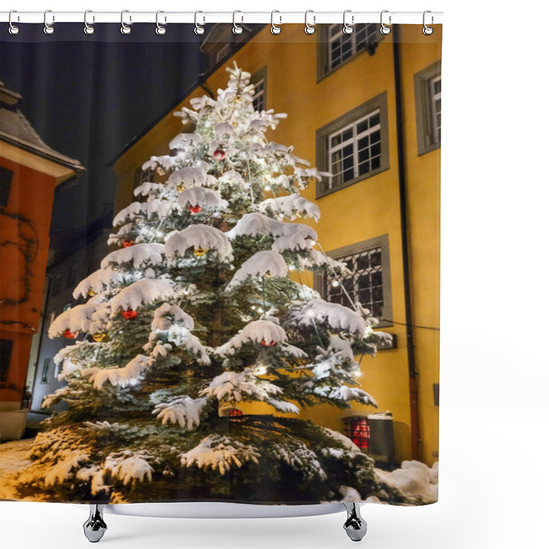 Personality  View Of The Christmas Tree In The Evening, Decorated With Lights, Christmas Balls And Covered With White Fluffy Snow. In The Background - Yellow And Red Buildings. Shower Curtains