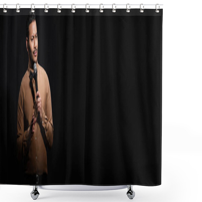 Personality  Skeptical Indian Comedian In Shirt And Bow Tie Holding Microphone During Monologue On Black, Banner Shower Curtains