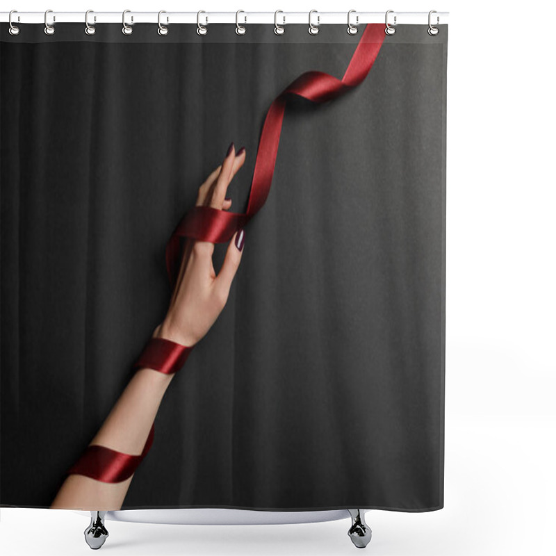 Personality  Cropped View Of Female Hand And Satin Red Ribbon On Black Background Shower Curtains