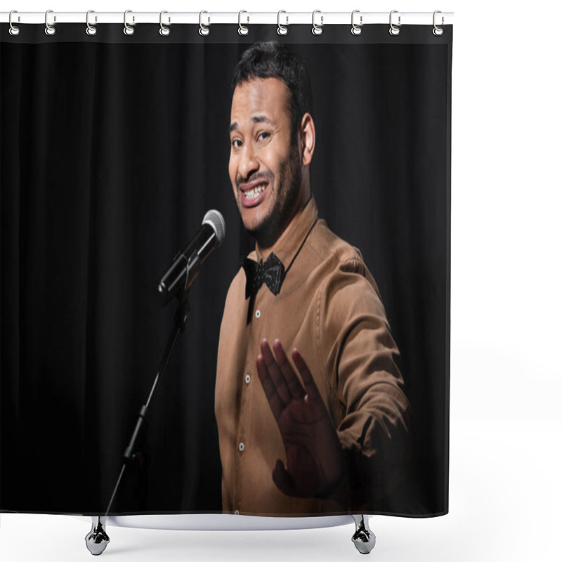 Personality  Displeased Indian Stand Up Comedian Showing Stop Gesture While Telling Jokes Into Microphone Isolated On Black  Shower Curtains