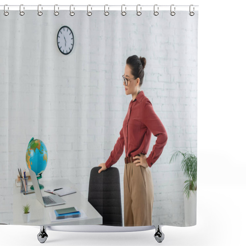 Personality  Young Teacher In Eyeglasses Standing With Hand On Hip And Looking At Laptop On Desk  Shower Curtains