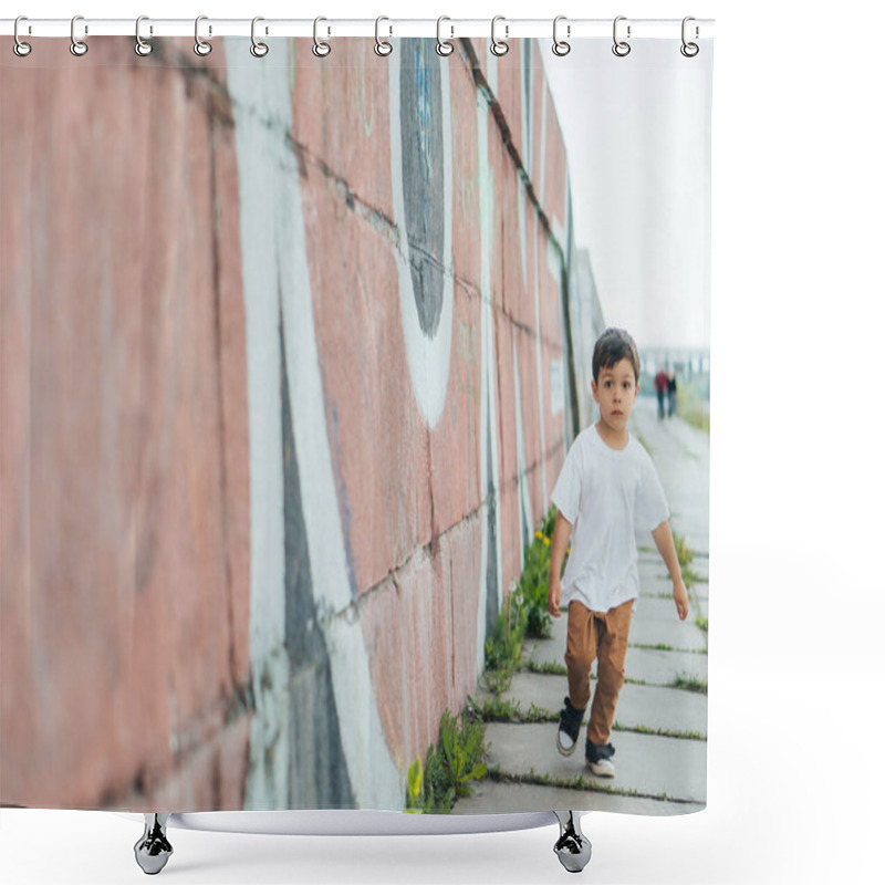 Personality  Selective Focus Of Cute Boy Running Near Wall With Graffiti  Shower Curtains