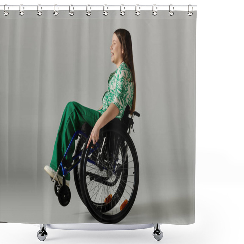 Personality  A Young Woman In Green Attire Sits In A Wheelchair Against A Grey Background, Smiling Brightly. Shower Curtains