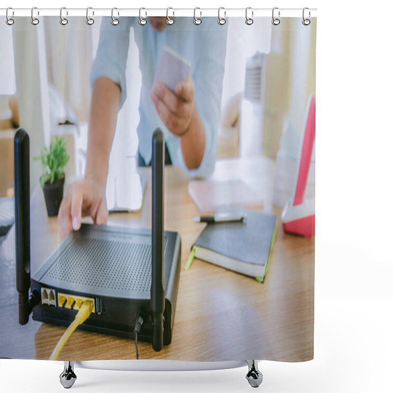 Personality  Closeup Of A Wireless Router And A Man Using Smartphone On Living Room At Home Ofiice, Equipment For  Working From Home, While In Quarantine Isolation During The Covid-19 Health Crisis.        Shower Curtains