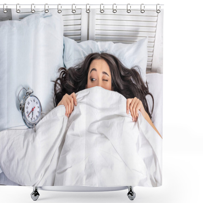 Personality  Young Beautiful Asian Woman Looking At Alarm Clock From Under The Blanket With Squinting One Eye Shower Curtains