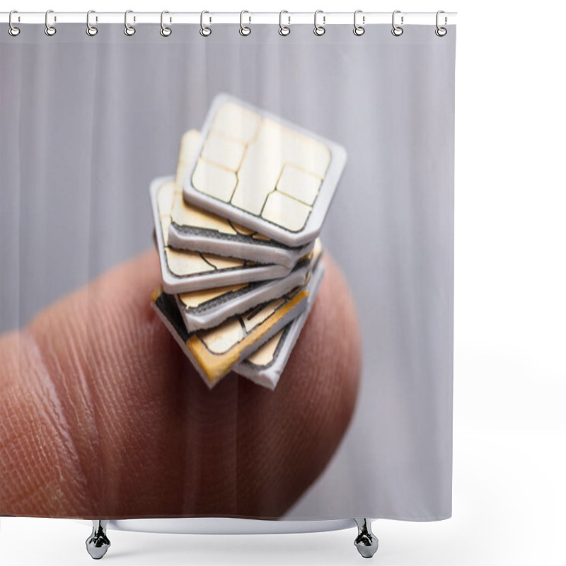 Personality  Stacked Of Nano Sim Cards On Person's Finger Shower Curtains