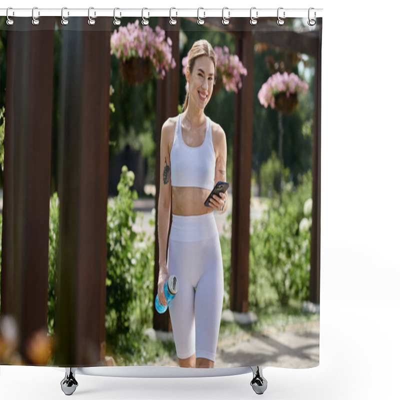 Personality  A Young Woman In White Activewear Walks Through A Park, Smiling And Holding A Water Bottle And Her Phone. Shower Curtains