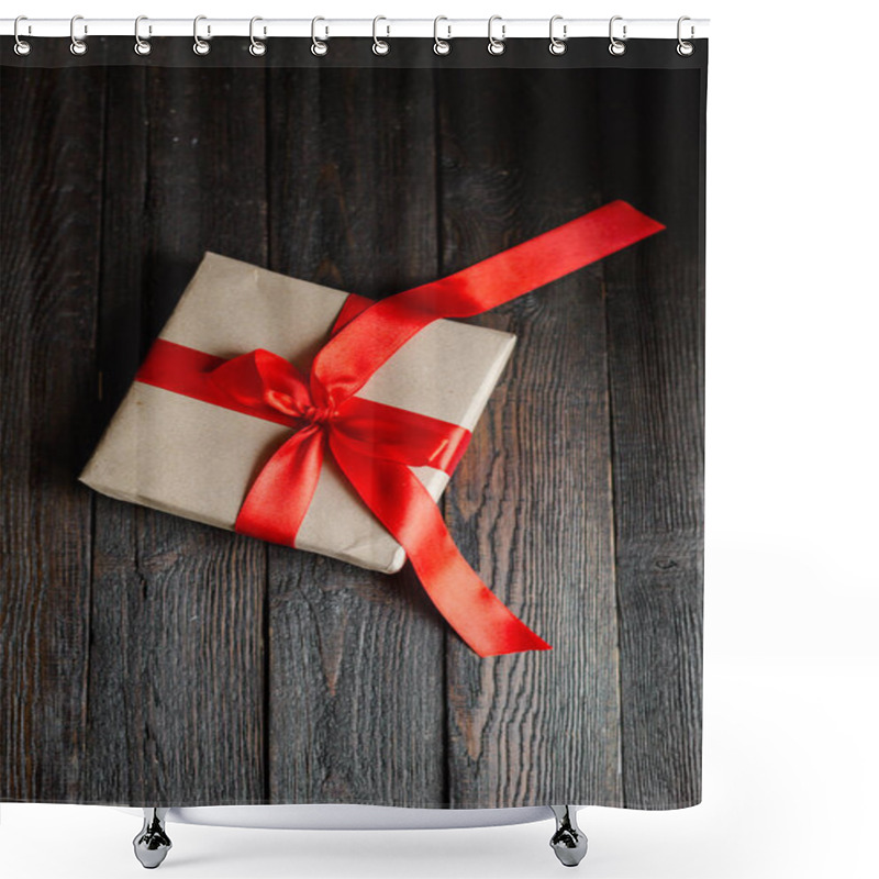 Personality  A Gift Box Of Kraft Paper, Handmade, Red Ribbon, Dark Wooden Background. Holiday Concept Shower Curtains