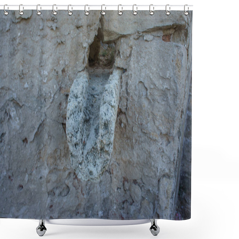 Personality  A Unique Stone Carving Stands Out On A Weathered Wall, Showcasing Intricate Details And Historical Significance. Shower Curtains